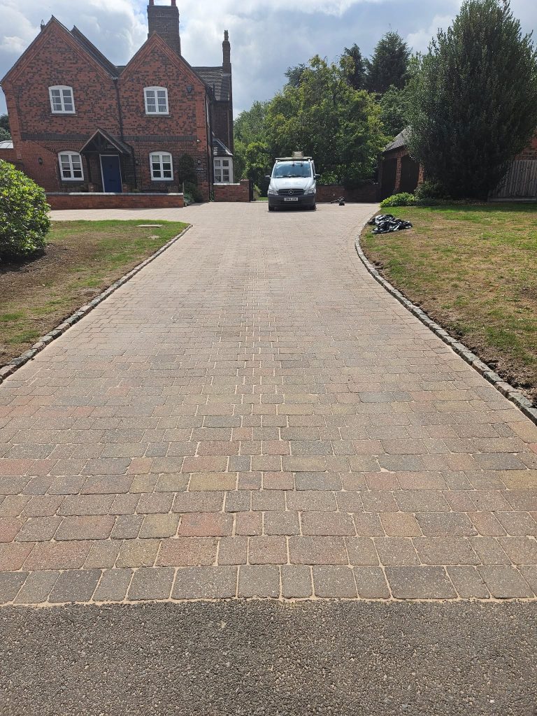 image of a block driveway that has been cleaned and restored by Modus