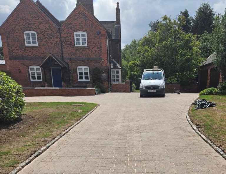 image of a driveway just cleaned by Modus